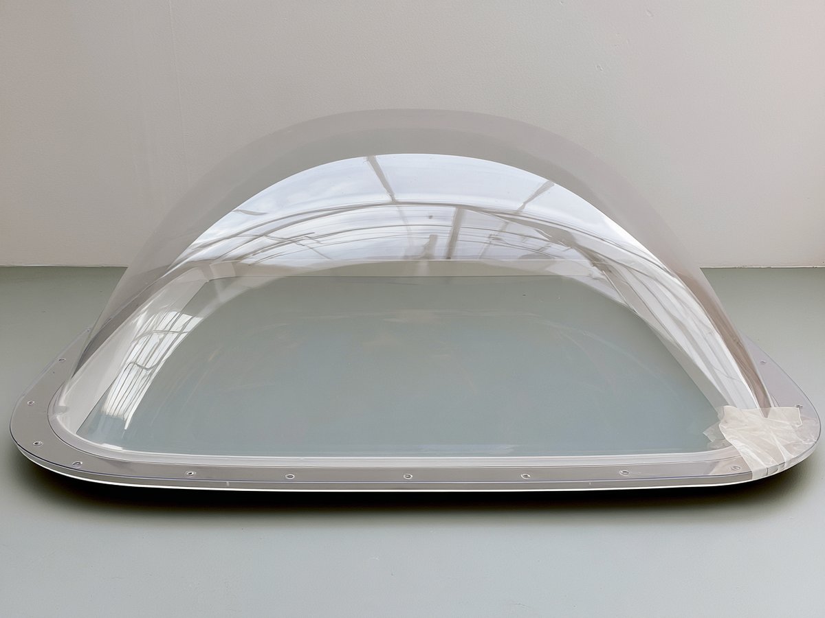 Clear polycarbonate bubble skylight dome with a flanged square base